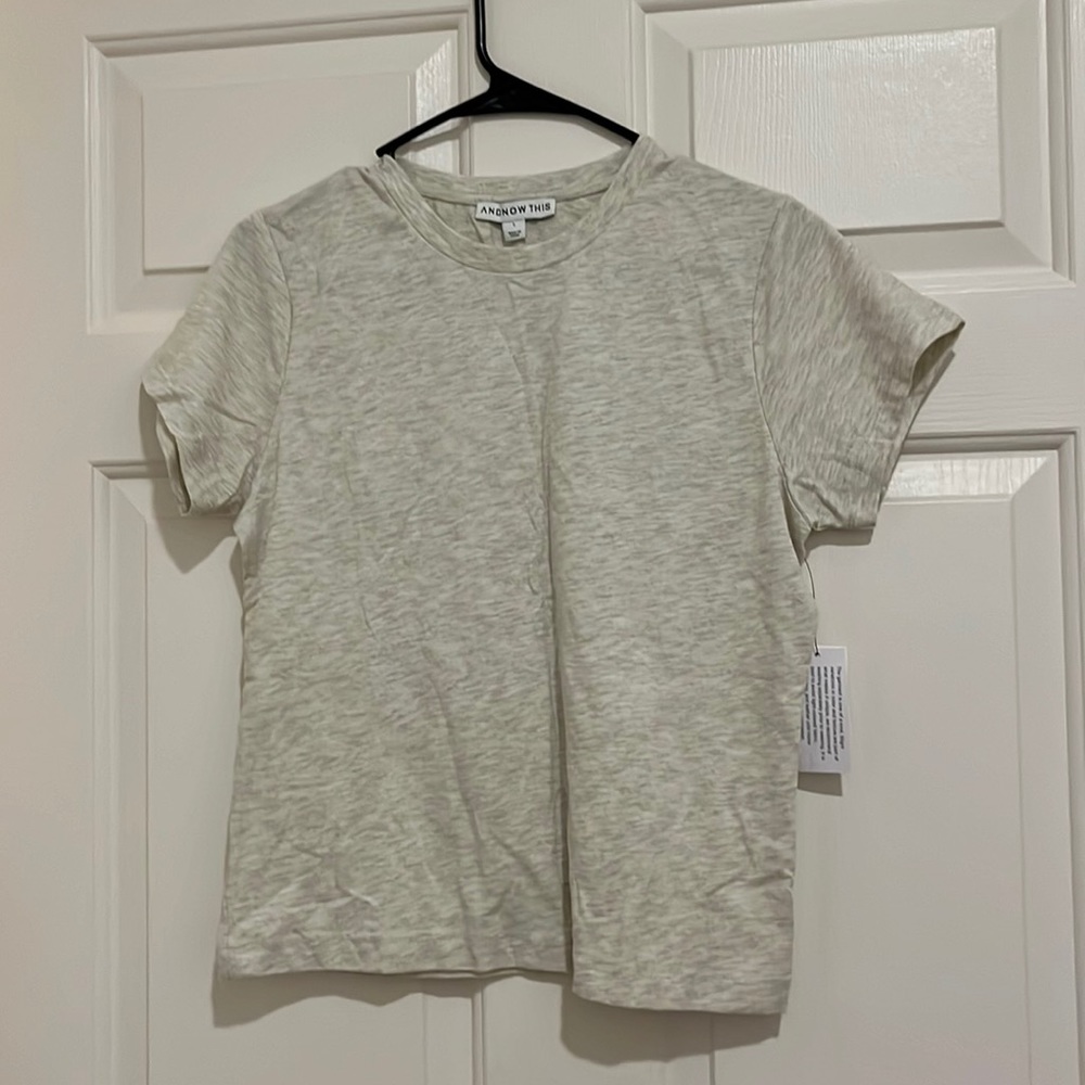 And now this large oatmeal colored T-shirt new with tags